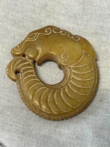 Double-Sided Ring-Form Jade Jue with Dragon Motif