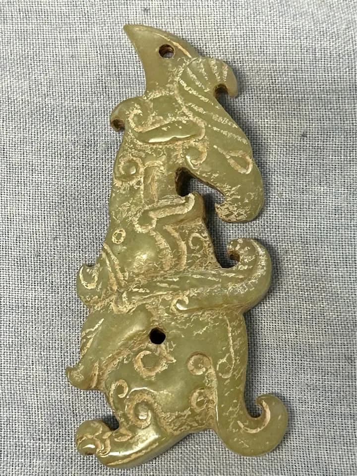 Warring States–Han Relief-Carved Dragon and Phoenix Pendant