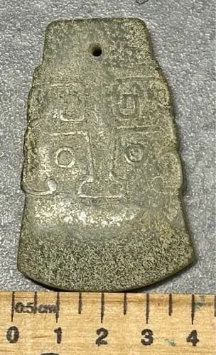Carved Stone Face Pendant